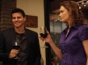 BONES:  Booth (David Boreanaz, L) and Brennan (Emily Deschanel, R) toast their friends during a Christmas celebration in the BONES episode "The Goop on the Girl" airing Thursday, Dec. 10 (8:00-9:00 PM ET/PT) on FOX.  ©2009 Fox Broadcasting Co.  Cr:  Greg Gayne/FOX