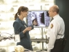 BONES:  Brennan (Emily Deschanel, L) gets some help from the Jeffersonian's security guard (guest star Enrico Colantoni, R) when she investigates the death of a surgeon in "The Doctor in the Photo" episode of BONES airing Thursday, Dec. 9 (8:00-9:00 PM ET/PT) on FOX.  ©2010 Fox Broadcasting Co.  Cr:  Adam Taylor/FOX