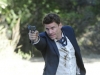 BONES:  Booth (David Boreanaz) aims at a suspect in "The Bullet in the Brain" episode of BONES airing Thursday,  Jan. 27 (9:00-10:00 PM ET/PT) on FOX.  Â©2011 Fox Broadcasting Co.  Cr:  Ray Mickshaw/FOX