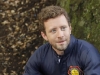 BONES:  Hodgins (TJ Thyne) investigates remains found in a paintball field in "The Memories in the Shallow Grave" Season Seven premiere of BONES airing Thursday, Nov. 3 (9:00-10:00 ET/PT) on FOX.  ©2011 Fox Broadcasting Co. Cr:  Beth Dubber/FOX