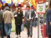 BONES:  Brennan (Emily Deschanel, L) and Booth (David Boreanaz, R) attend the Gluttony Games, an eating contest, in
