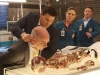 BONES:  Booth (David Boreanaz, second from L) and Brennan (Emily Deschanel, second from R) race against time to persuade a scientist (guest star Lennie Loftin, L) to help the Jeffersonian team stop a viral outbreak in the