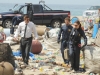 BONES:  Brennan (Emily Deschanel, R), Booth (David Boreanaz, L) and Hodgins (TJ Thyne, C) investigate remains washed up on the beach in the "The Bod in the Pod" episode of BONES airing Monday, Nov. 19 (8:00-9:00 PM ET/PT) on FOX.  ©2012 Fox Broadcasting Co.  Cr:  Ray Mickshaw/FOX