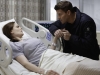 BONES:  Booth (David Boreanaz, R) is worried about Brennan's (Emily Deschanel, L) condition after she is shot while working late at the Jeffersonian lab in the