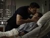 BONES:  Booth (David Boreanaz, L) is worried about Brennan's (Emily Deschanel, R) condition after she is shot while working late at the Jeffersonian lab in the