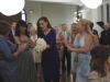 BONES:  Brennan (Emily Deschanel, second from R) catches the bouquet at Booth's mother's wedding in the