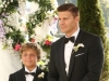 BONES:  At Brennan and Booth's wedding, Booth (David Boreanaz, R) and his son Parker (guest star Ty Panitz, L) watch as Brennan walks down the aisle in the "The Woman in White" episode of BONES airing Monday, Oct. 21 (8:00-9:00 PM ET/PT) on FOX.  ©2013 Fox Broadcasting Co.  Cr:  Ray Mickshaw/FOX