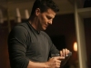 BONES:  Booth (David Boreanaz) pepares for a possible confrontation in the "The Recluse in the Recliner" Season Finale episode of BONES airing Monday, May 19 (8:00-9:00 PM ET/PT) on FOX.  Â©2014 Fox Broadcasting Co.  Cr:  Adam Taylor/FOX