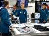 BONES:  L-R:  Hodgins (TJ Thyne), Dr. Clark Edison (guest star Eugene Byrd), Brennan (Emily Deschanel) and Cam (Tamara Taylor) continue to investigate who framed Booth for murder in the "The Lance to the Heart" episode of BONES airing Thursday, Oct. 2 (8:00-9:00 PM ET/PT) on FOX.  Â©2014 Fox Broadcasting Co.  Cr:  Jordin Althaus/FOX