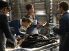 BONES:  Brennan (Emily Deschanel, second from L), Angela (Michaela Conlin, second from R) and Hodgins (TJ Thyne, R) examine the remains collected at the crime scene in the BONES episode "The Bond in the Boot" airing Thursday, Sept. 24 (8:00-9:00 PM ET/PT) on FOX.  ©2009 Fox Broadcasting Co.  Cr:  Greg Gayne/FOX